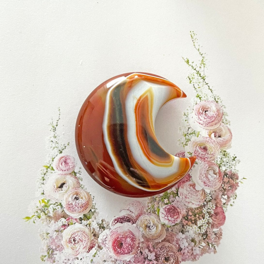 Banded carnelian moon carving