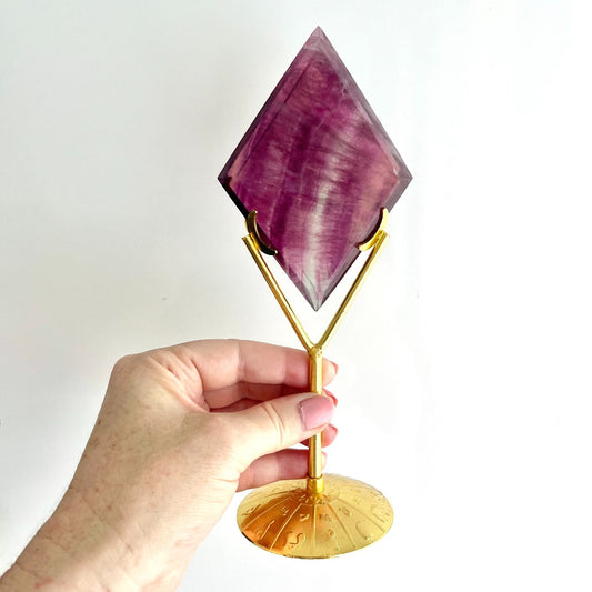 purple fluorite diamond carving on stand