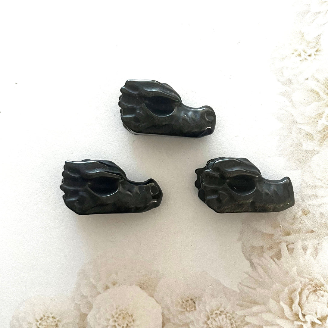 Golden sheen obsidian dragon head