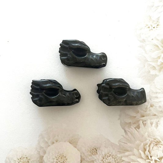 Golden sheen obsidian dragon head