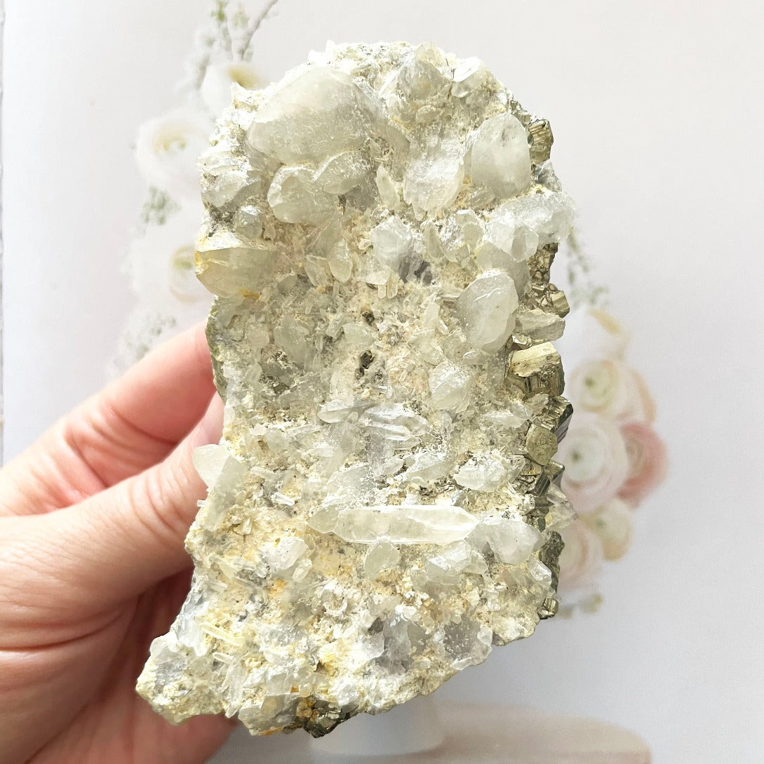 clear quartz cluster with pyrite