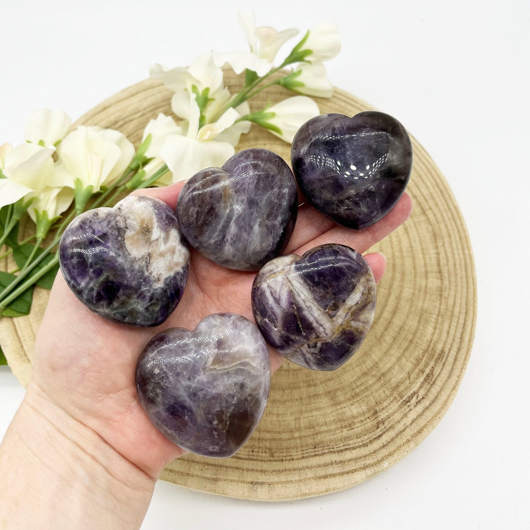 Polished dream amethyst crystal heart shapes