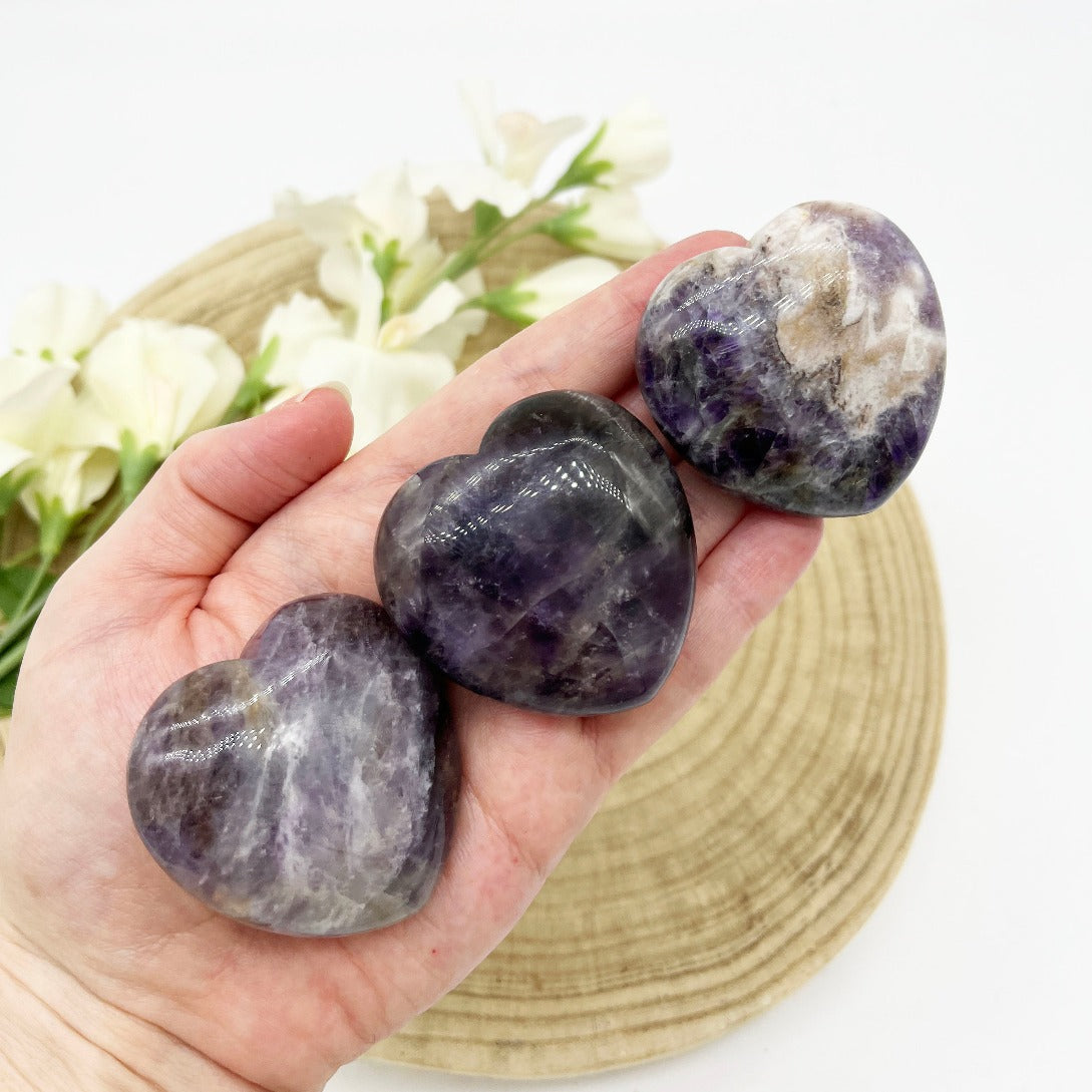 Dream amethyst or chevron amethyst polished crystal heart shapes