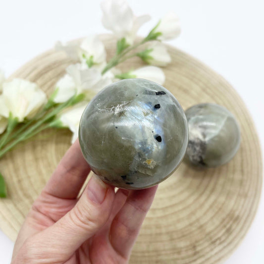Green moonstone garnierite crystal. polished sphere