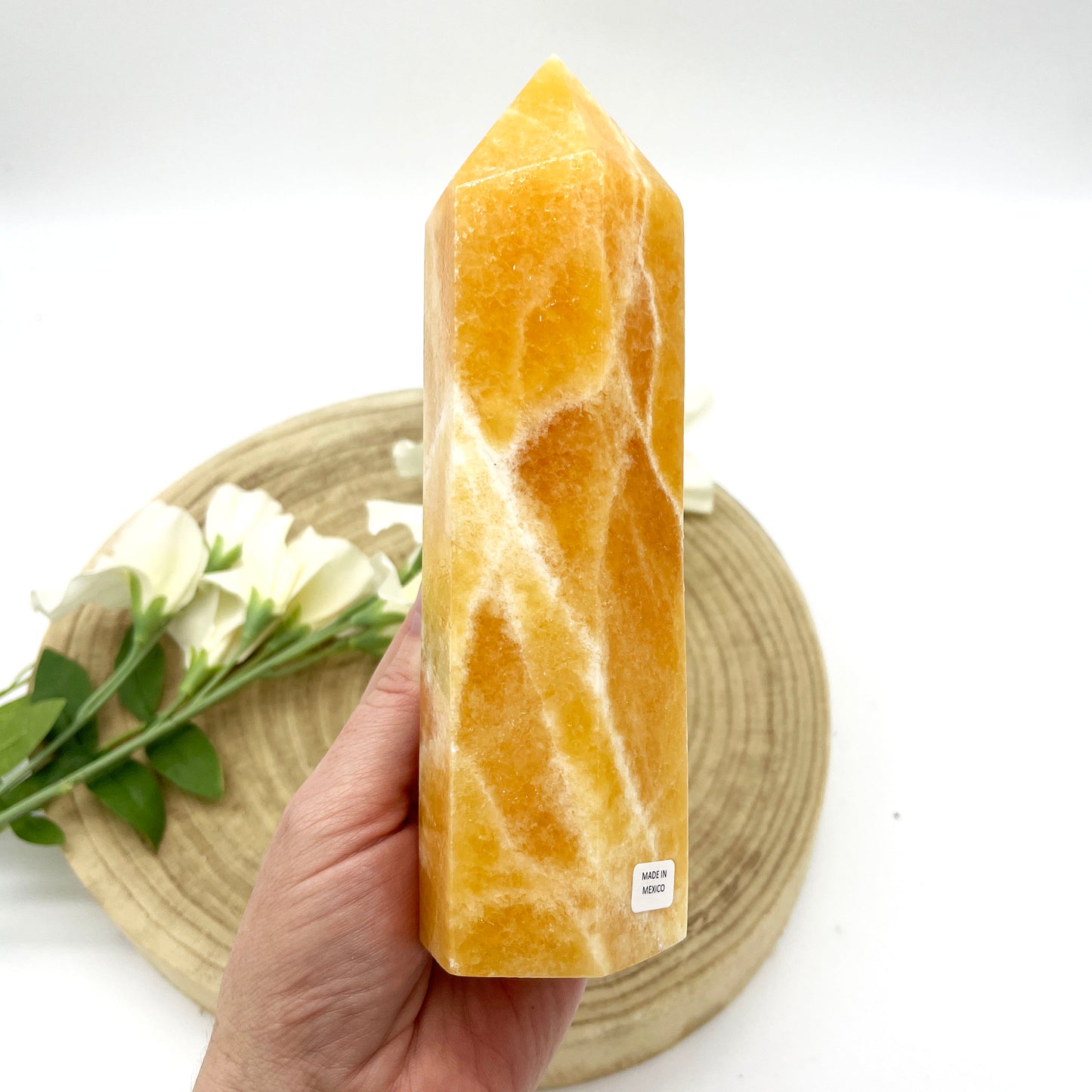 orange calcite generator polished crystal point