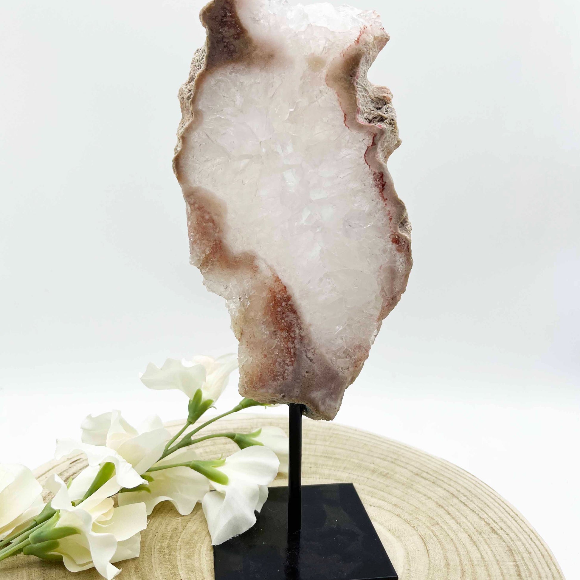 Pink amethyst slab on stand