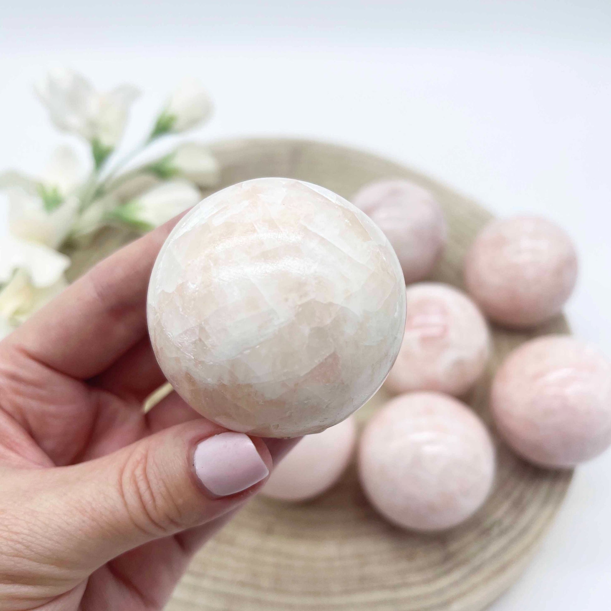 Pink calcite sphere crystal