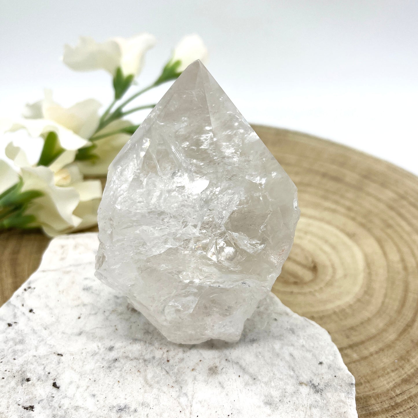 quartz crystal polished point with rough base