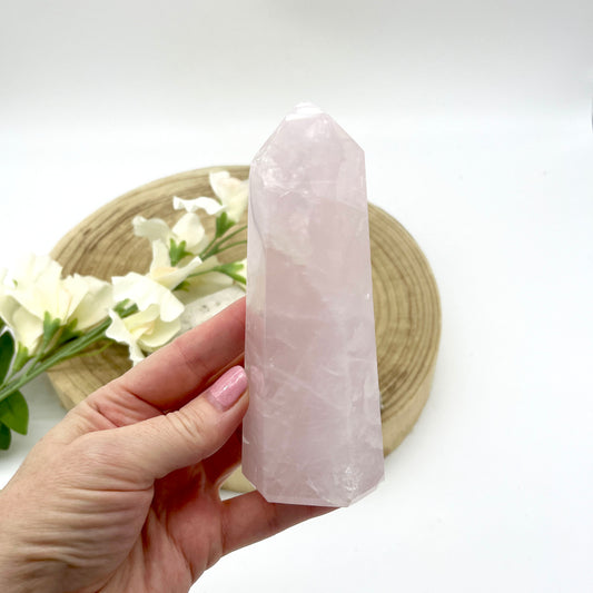 Rose quartz polished generator crystal point