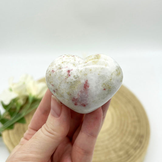 Polished cinnabrite heart