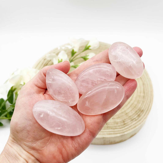 rose quartz palm stone crystals