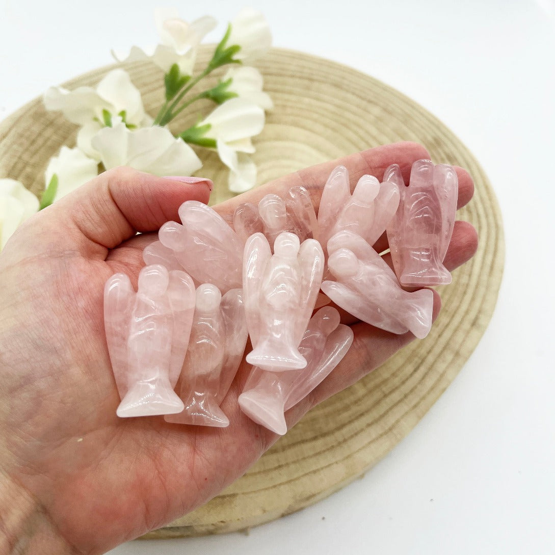 rose quartz angels. Polished and carved rose quartz